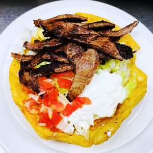 Chicken or steak taco salad